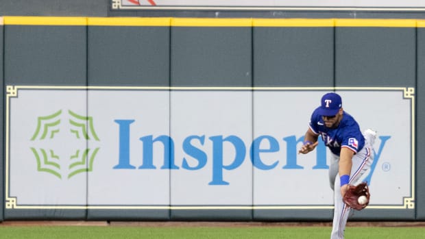 Sep 6, 2022; Houston, Texas, USA; Texas Rangers center fielder Leody Taveras (3) fields Houston Astros third baseman Alex Bregman (2)(not pictured) single in the fifth inning at Minute Maid Park. Mandatory Credit: Thomas Shea-USA TODAY Sports